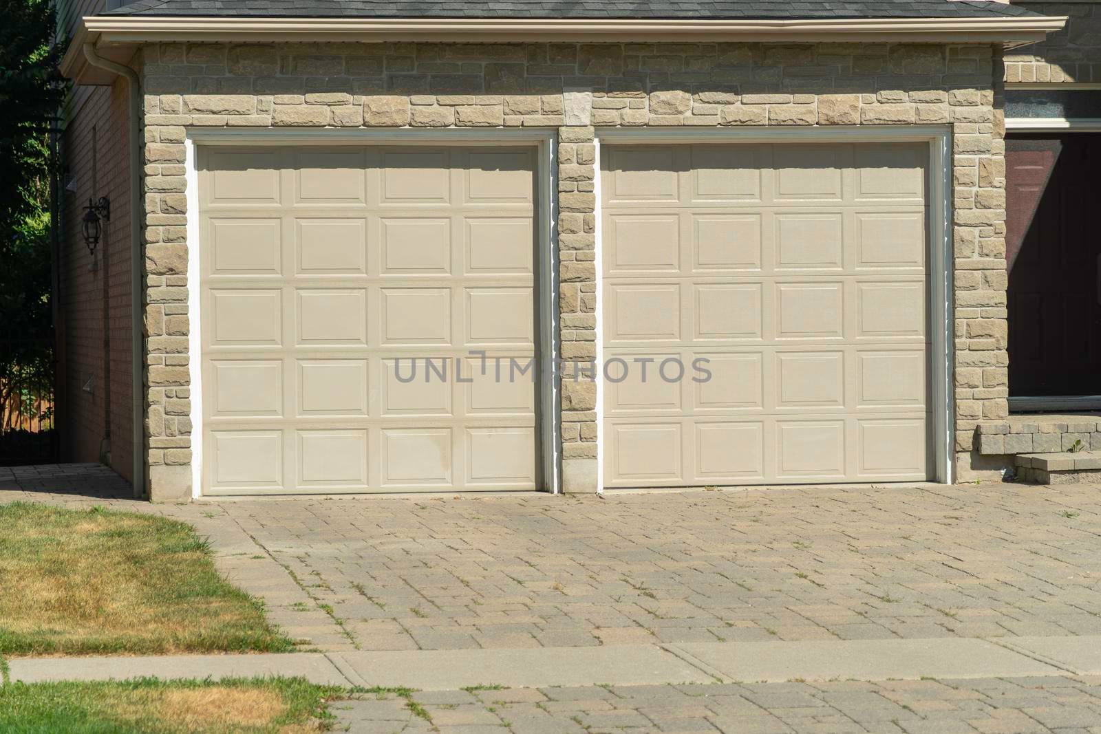 Two garage doors with tiled entry by ben44