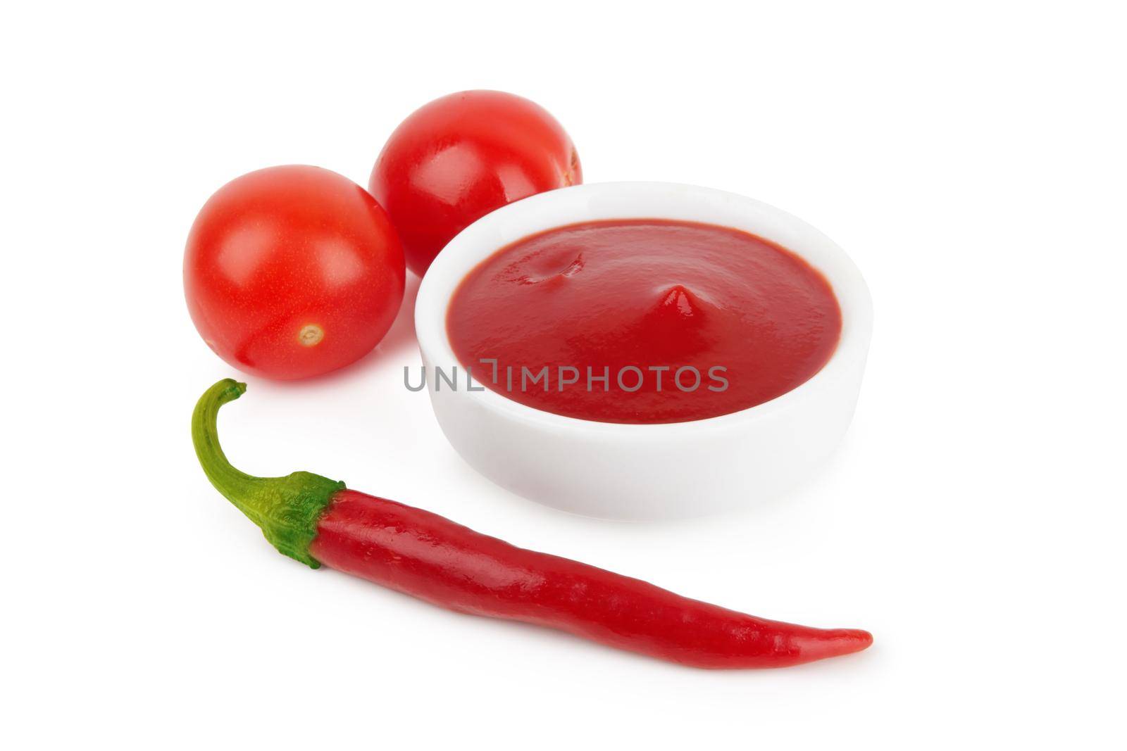 Bowl of tomato sauce ketchup isolated on white background