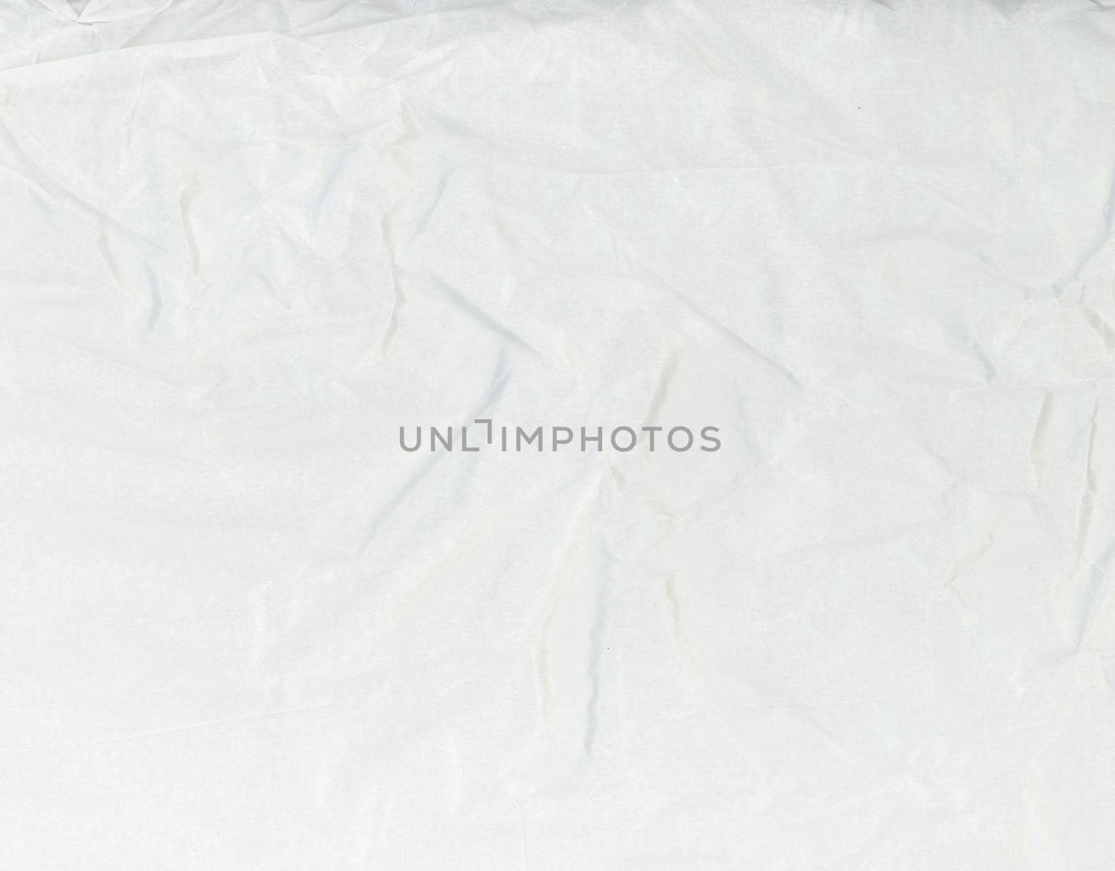 off white crumpled paper texture background by claudiodivizia