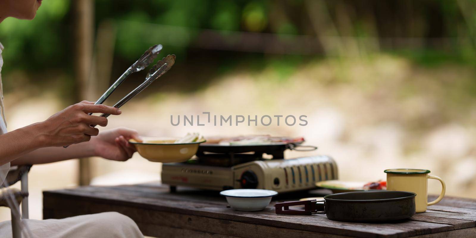 Asian woman journey and camping in Thailand. Travel outdoor activity lifestyle. by itchaznong