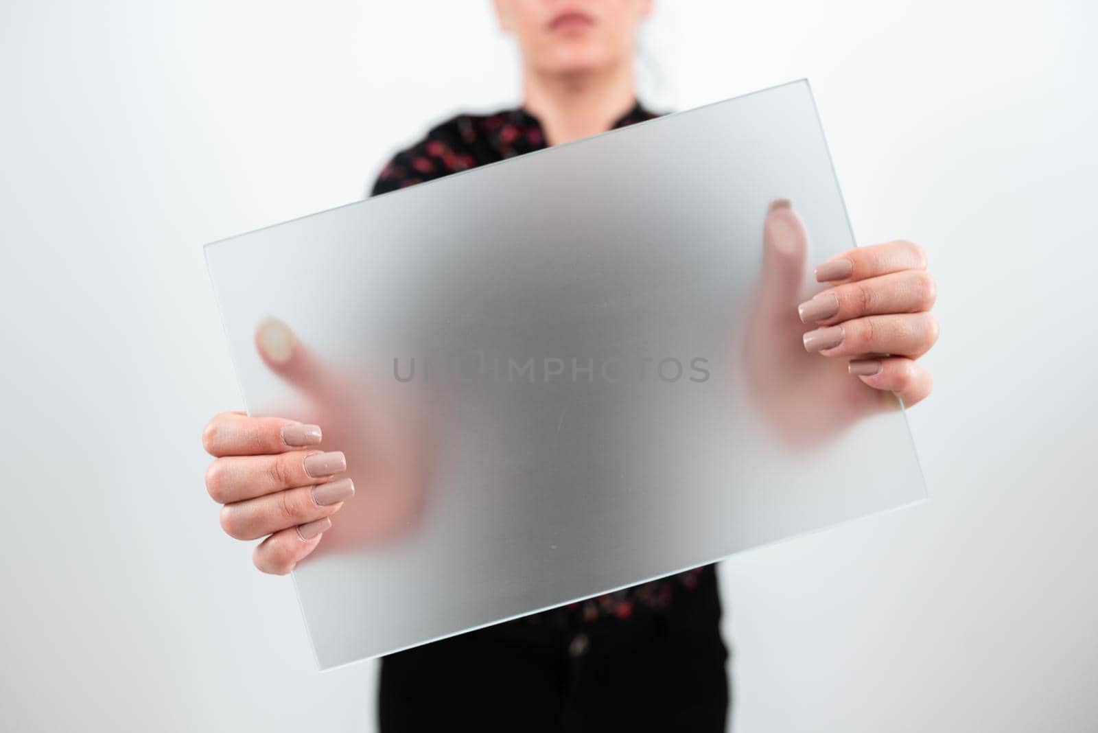 Woman Showing Placard With New Strategies For Business Marketing.