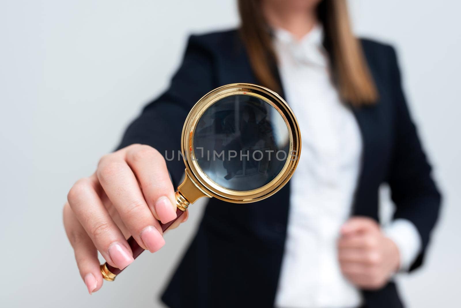 Woman Having Magnifying Glass To Point Important Information.