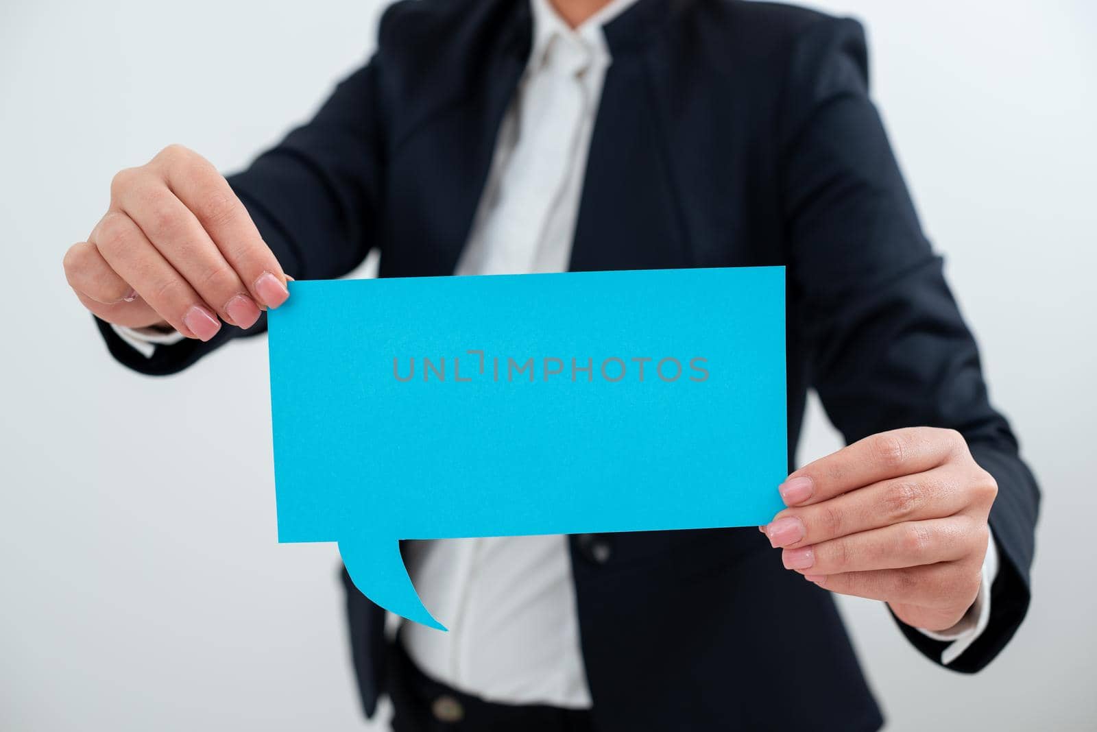 Businesswoman Holding Speech Bubble With Important Messages.