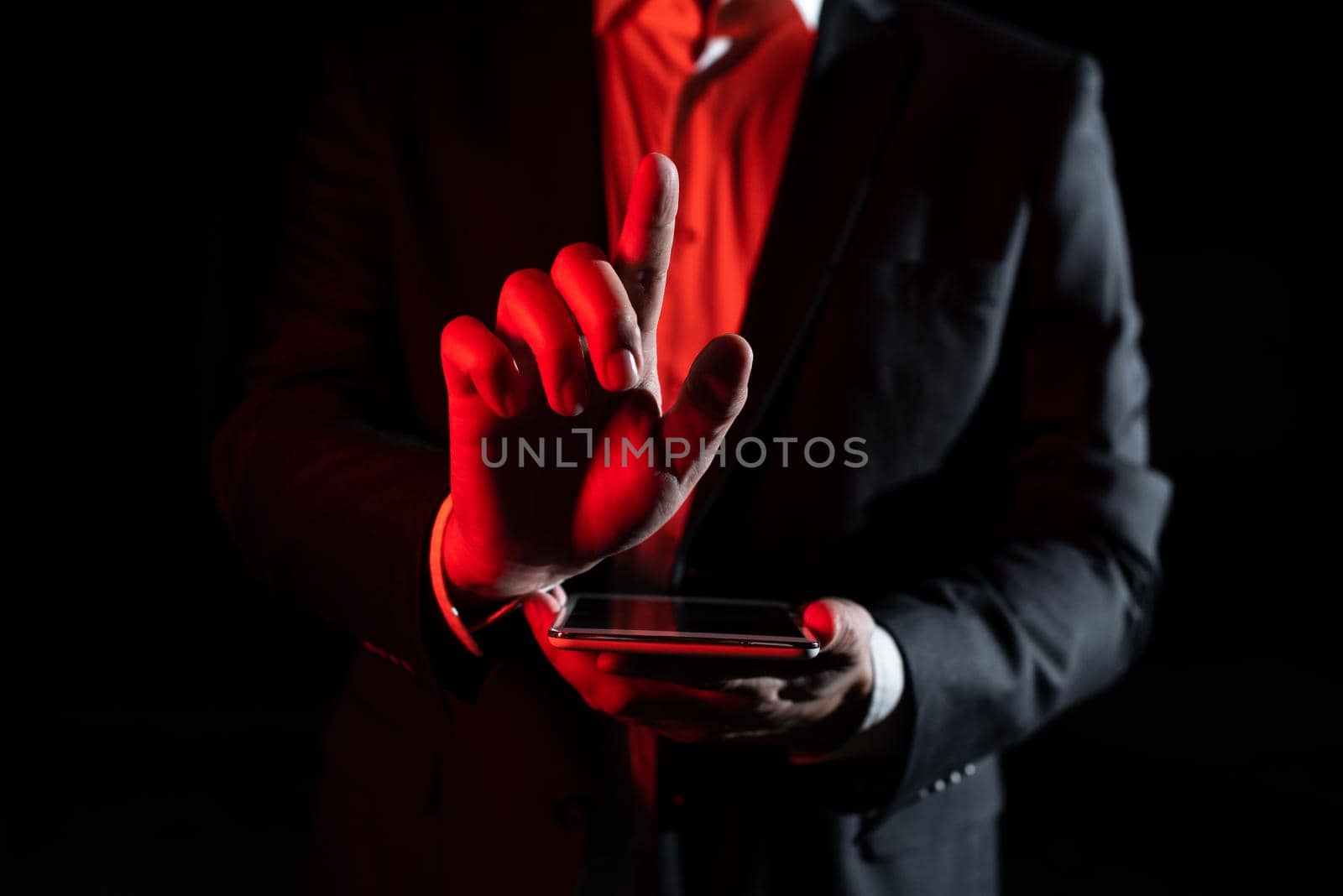 Man Holding Tablet And Pointing With One Finger On Important Message