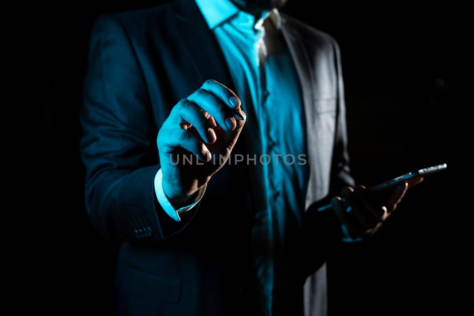 Businessman Pointing Important Infortmations With One Finger.