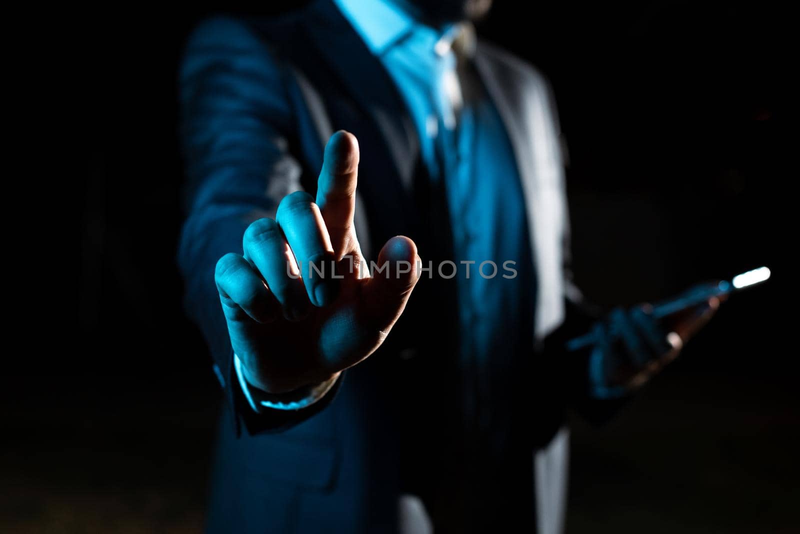 Businessman Pointing Important Infortmations With One Finger.