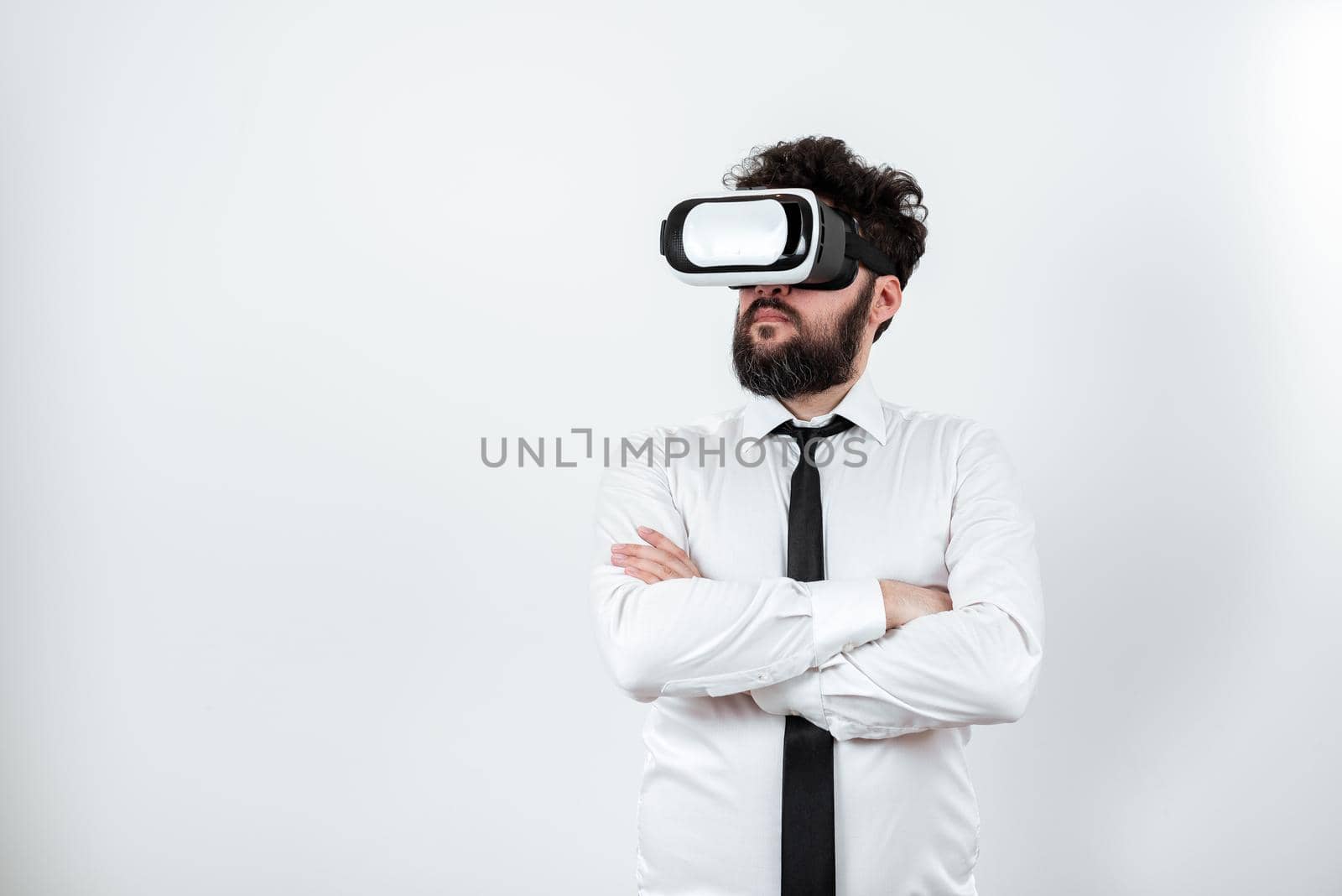 Standig Man With Crossed Arms Having Vr Glasses Presenting Important Ideas.