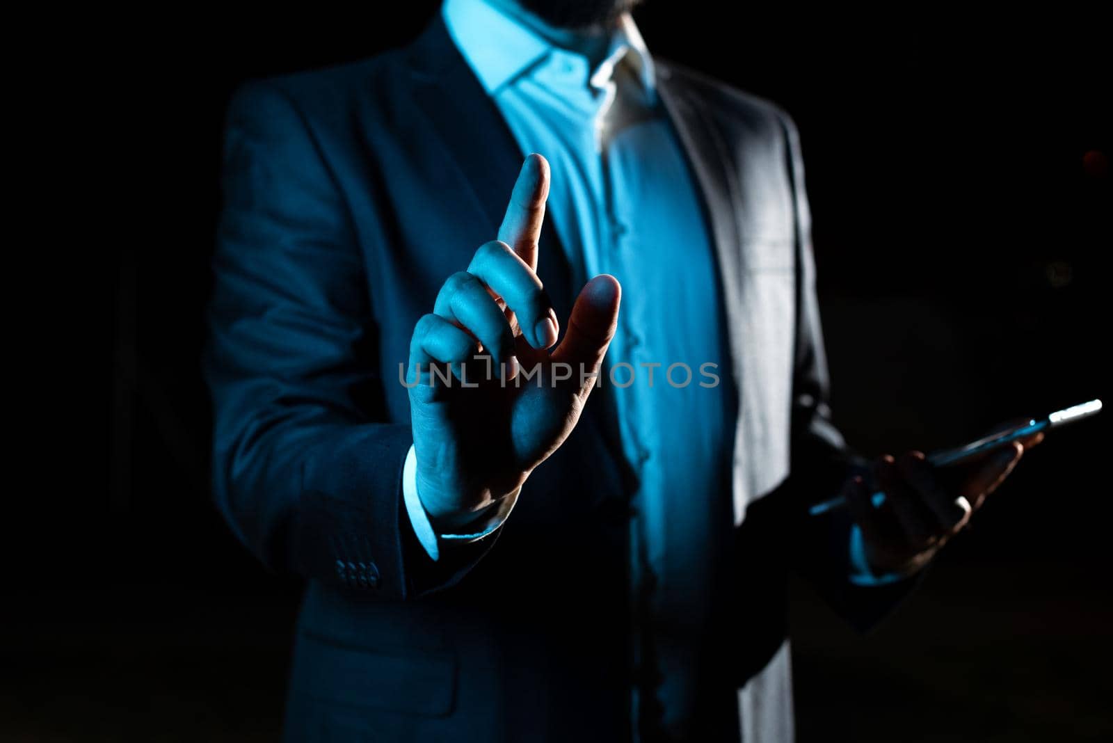 Businessman Pointing Important Infortmations With One Finger.