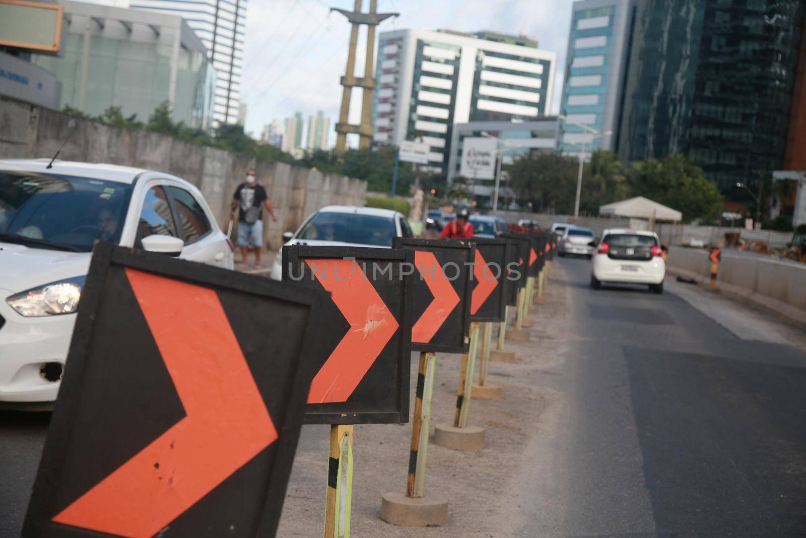 salvador, bahia, brazil - july 19, 2022: lane reduction signage at street construction site in Salvador city.