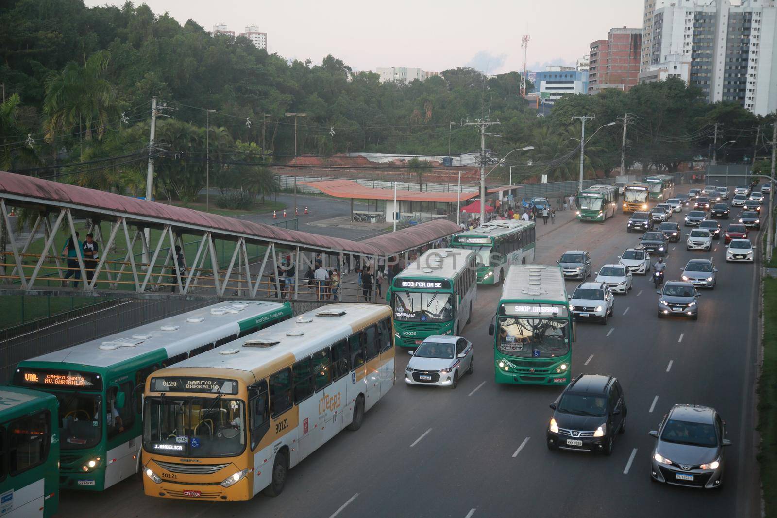 salvador, bahia, brazil - july 19, 2022: passengers waiting for a public transport bus at a stop in the city of Salvador