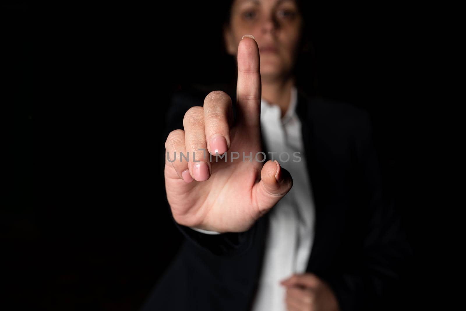 Businesswoman Pointing Important Infortmations With One Finger.