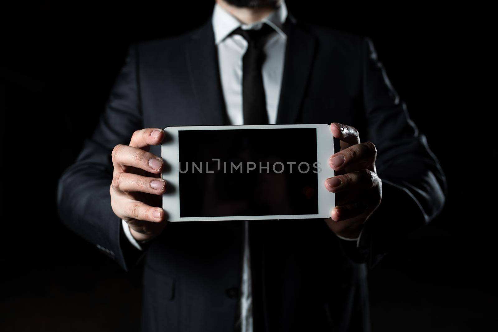 Businessman Presenting Important Informations On Phone Screen.