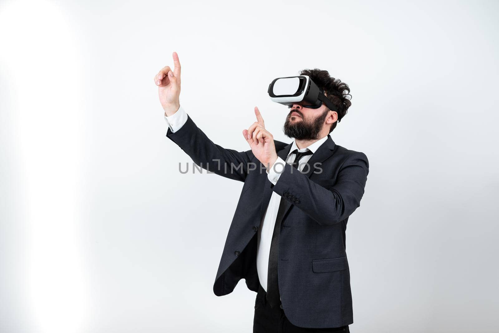 Man Wearing Vr Glasses And Pointing On Important Messages With Both Hands.