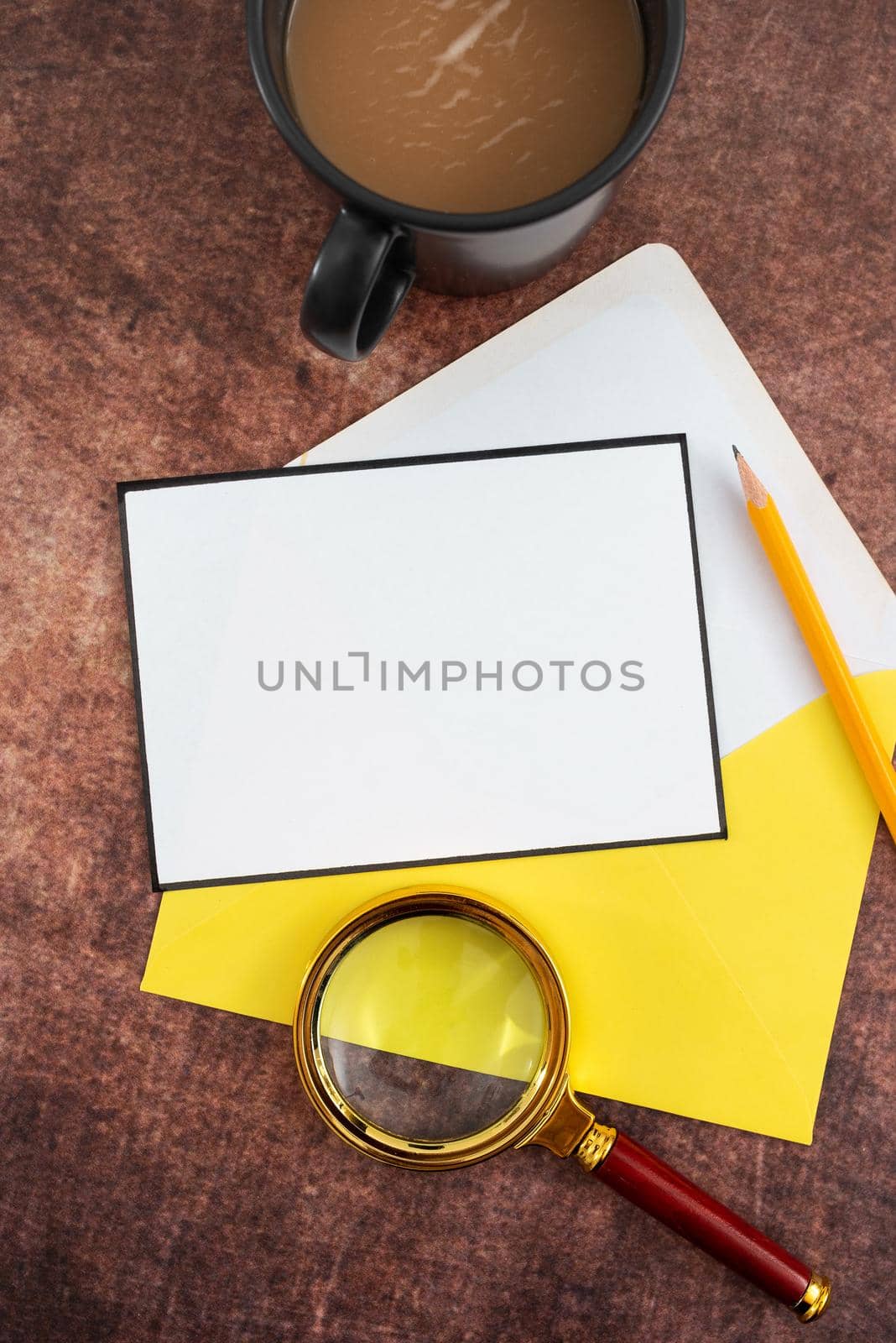 Blank Letter With Color Envelope, Pencil, Coffee Mug And Magnifying Glass Placed On Table. It Is Representing Important Strategies And Crucial Message For Business Progress. by nialowwa
