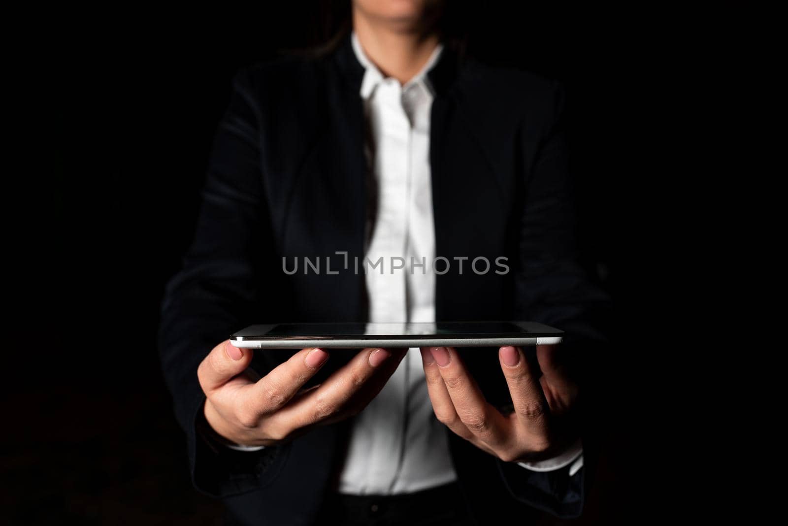 Businesswoman Holding Cellphone And Presenting Important Informations.