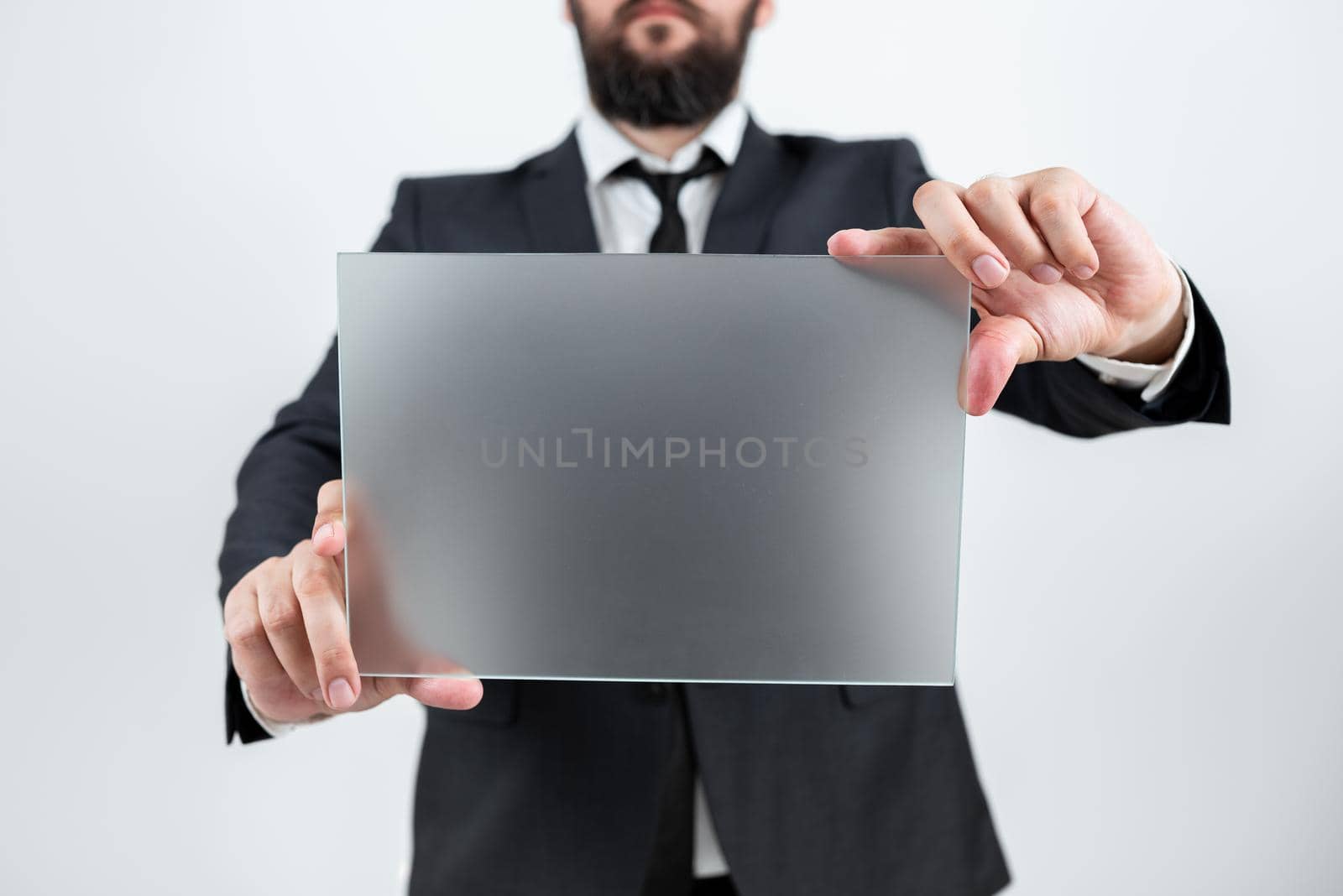 Male Professional Showing Placard And Advertising The Company.