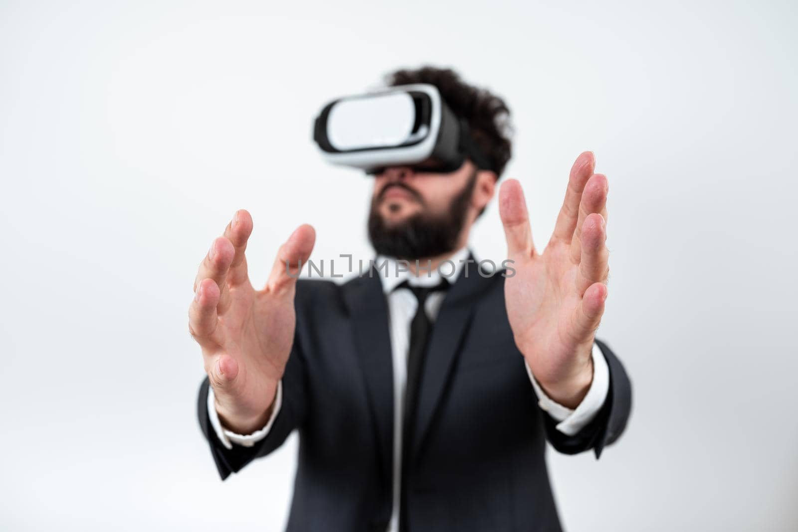 Man Wearing Vr Glasses Andpresenting Important Messages Between Hands.
