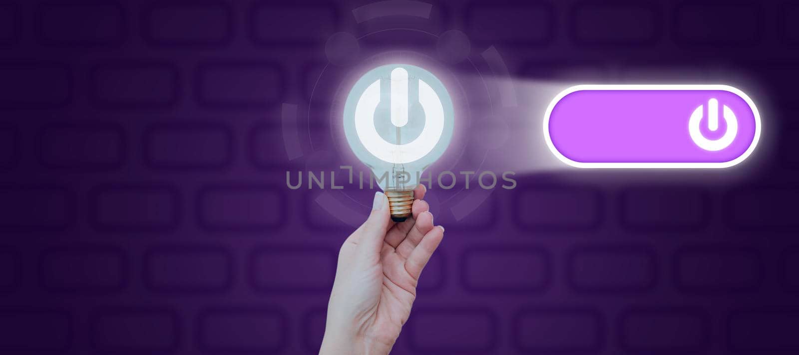 Hand Of Woman Holding Light Bulb With Power Button Symbol With Futuristic Design. Businesswoman Presenting New Ideas And Information For Business Development. by nialowwa