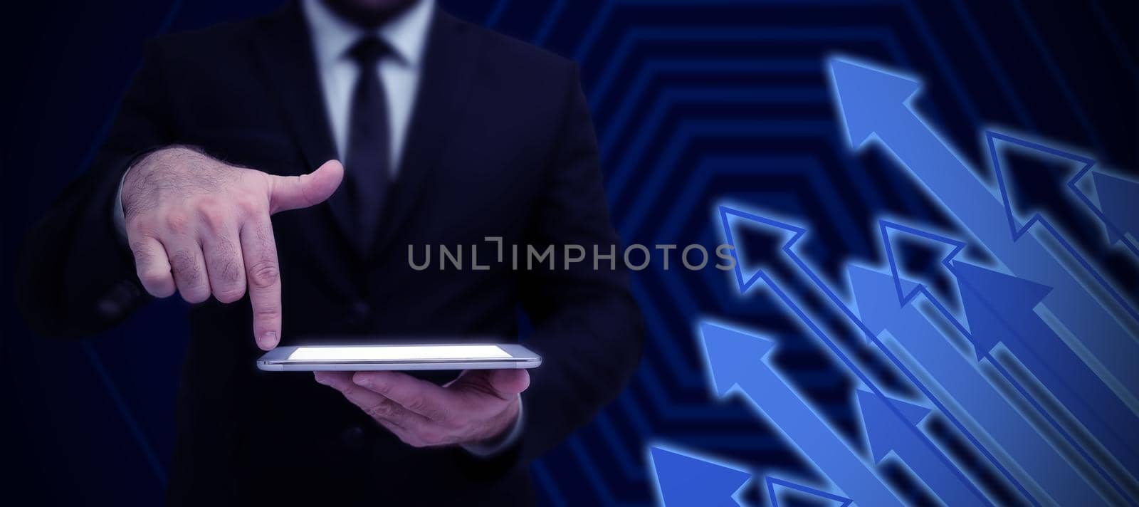 Businessman in suit holding tablet symbolizing successful teamwork accomplishing newest project plans. Man carrying electrical device representing combined effort management. by nialowwa