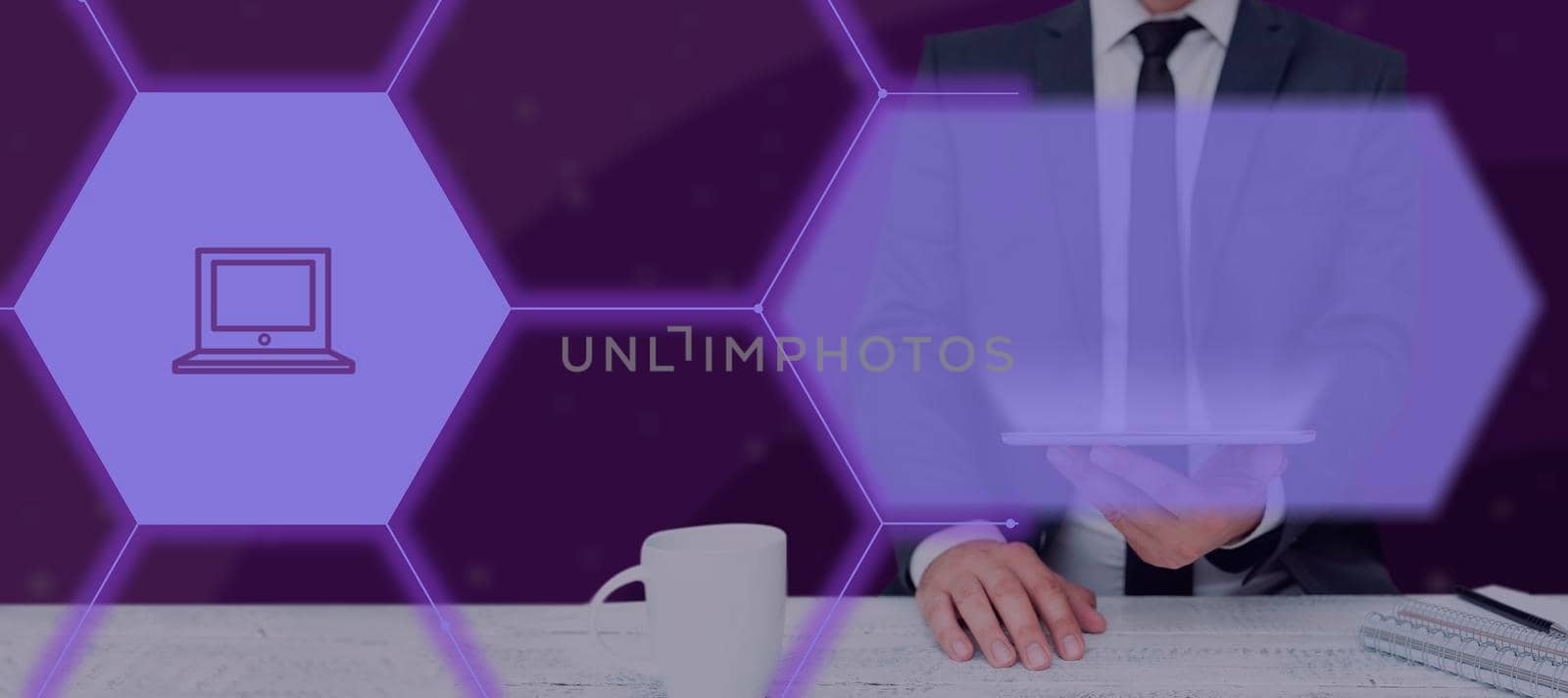 Businessman Holding A Tablet And Showing A Laptop In A Futuristic Hive Pattern. Man In Suit With Pad Presenting Crucial Information And Concepts In A Meeting. by nialowwa