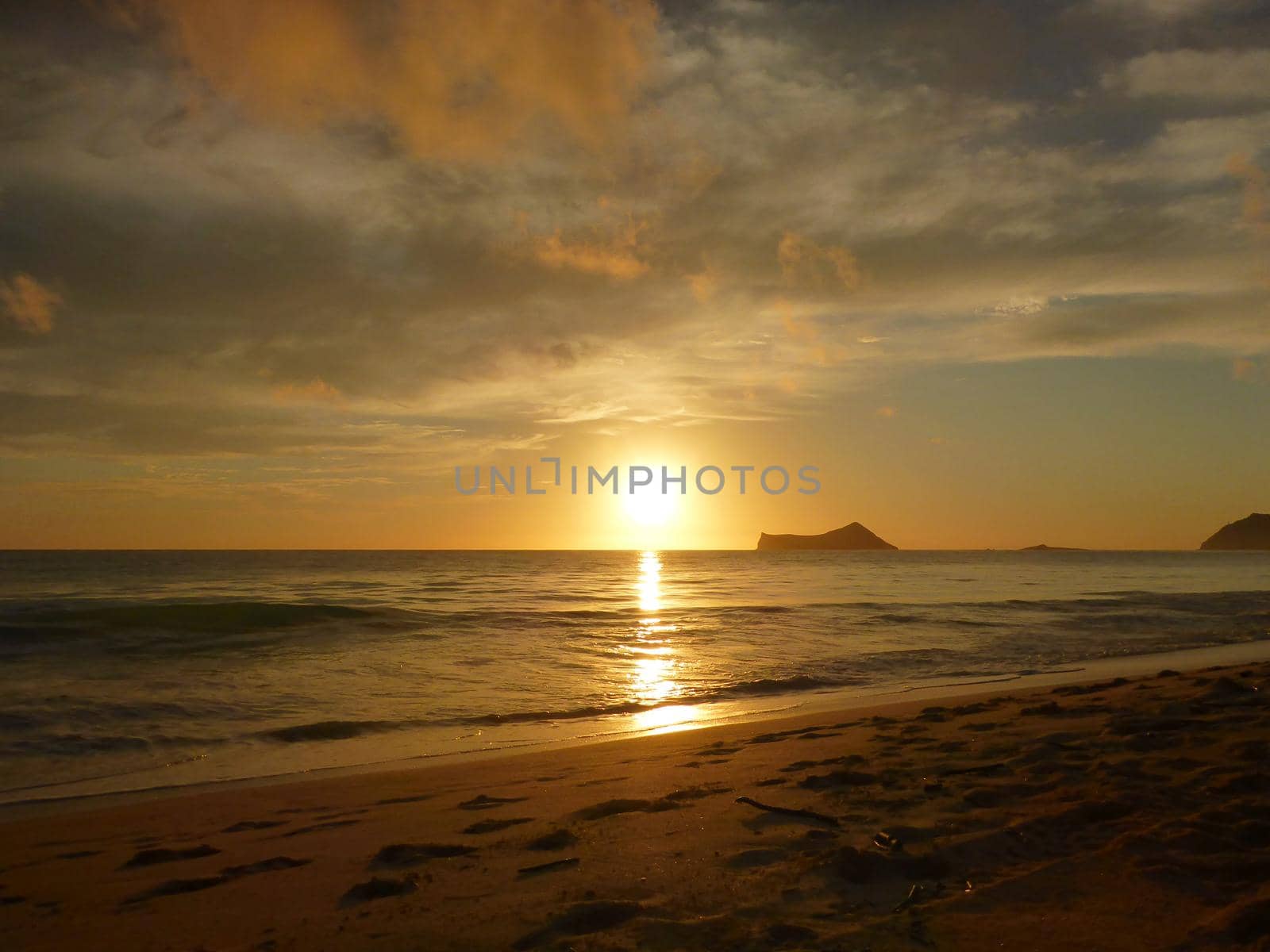 Early Morning Sunrise on Waimanalo Beach on Oahu by EricGBVD