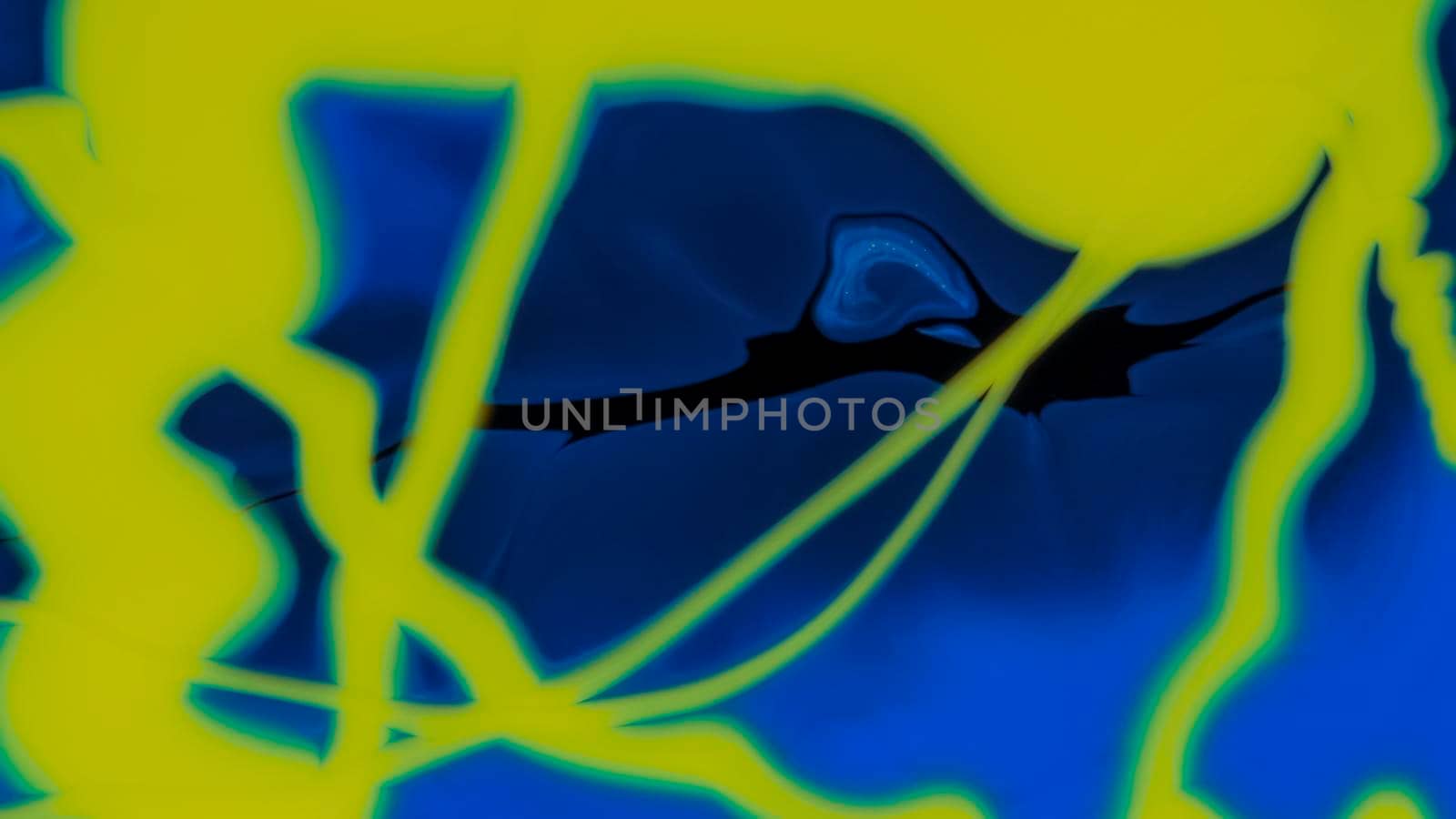 Fluid paint art, marble abstractions in blue, purple, black and yellow. Deep ink blanks. Abstract unique colorful background. Artistic painting of natural spreading. Abstract textural art. Liquid forms of design. Ink transitions. Colorful cell background, splash screen, background.