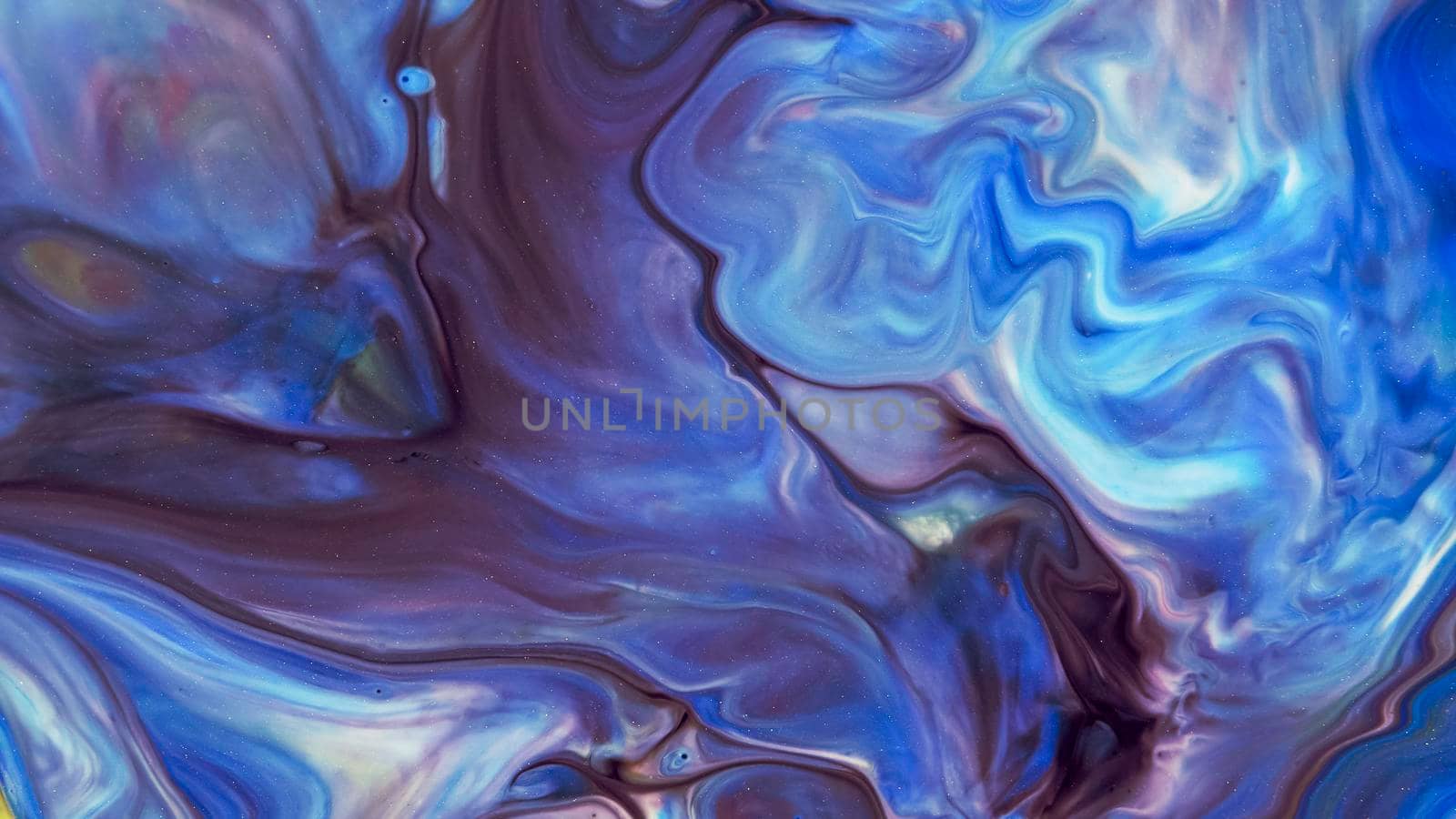 Blue streaks on a white background. Liquid abstractions. Abstract natural art. Abstract painting. Marble effect painting. Mixed azure and white oil paints. Unusual handmade background for poster, card, invitation.