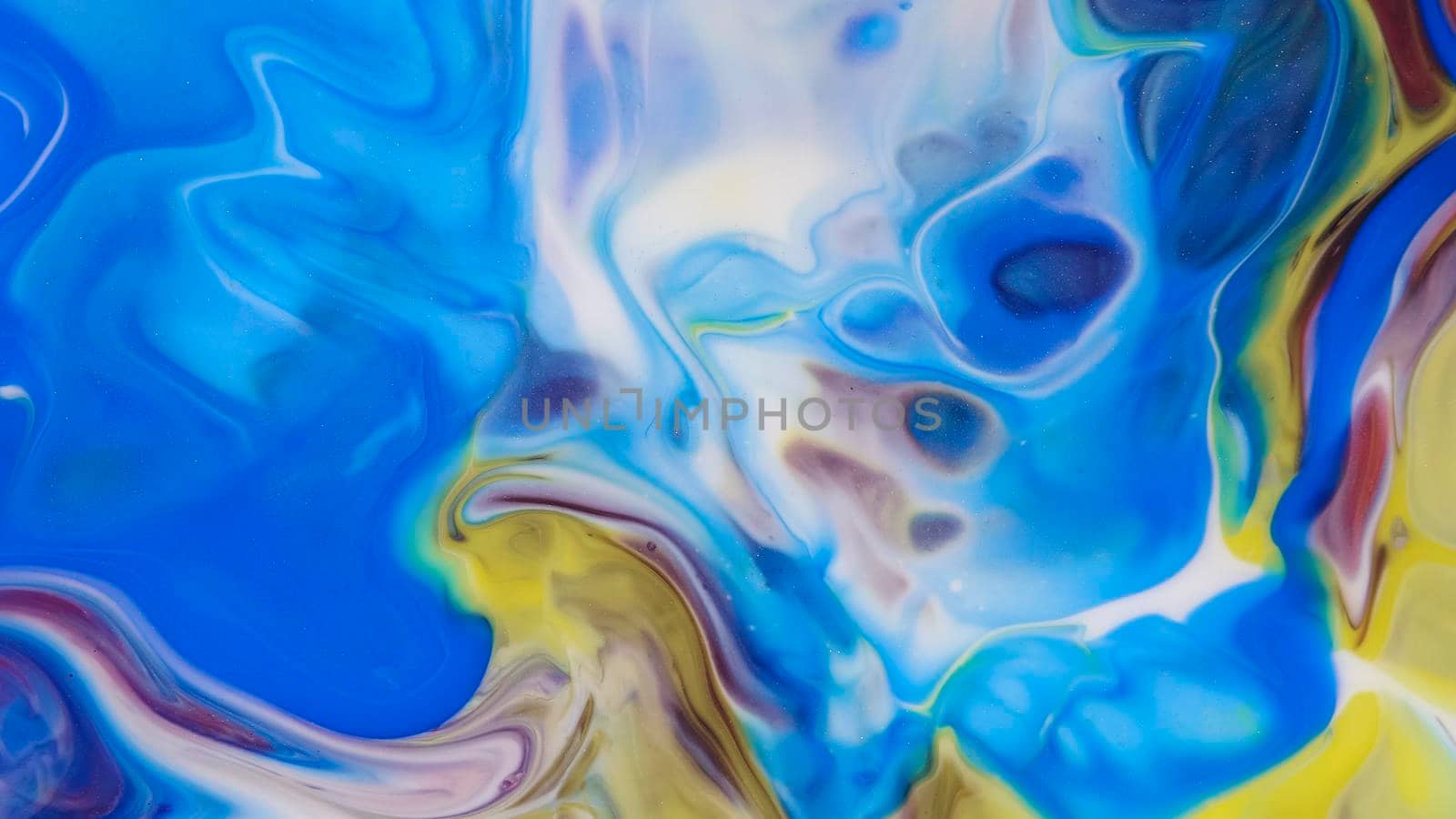 Blue stripes on a white background with gold flecks of yellow. Liquid abstractions. Abstract natural art. Abstract painting. Marble effect painting. Mixed azure and white oil paints. Unusual handmade background for poster, card, invitation.