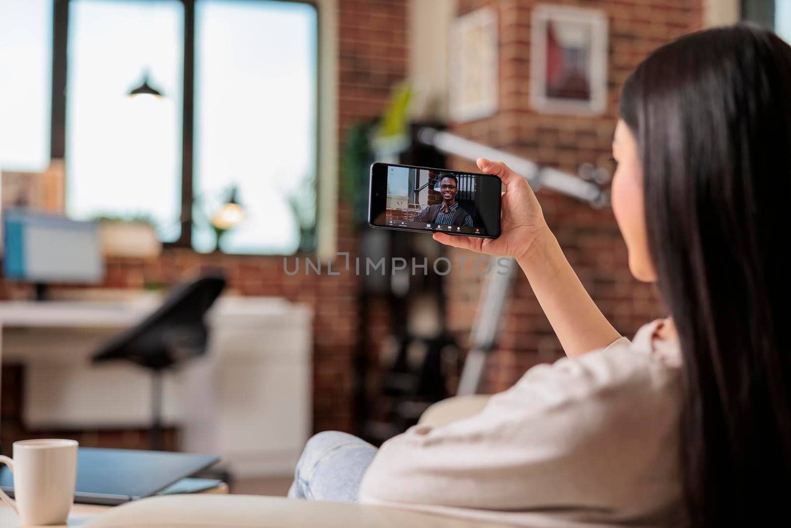 Asian woman on video call meeting online communication by DCStudio