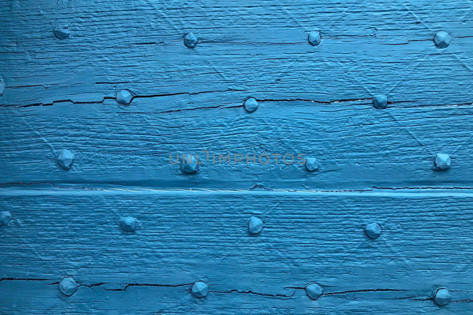 Wooden door with ancient square patten