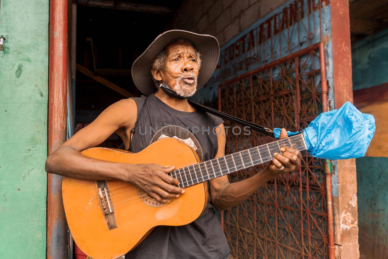 Native African American singer from Bluefields playing guitar and singing by cfalvarez