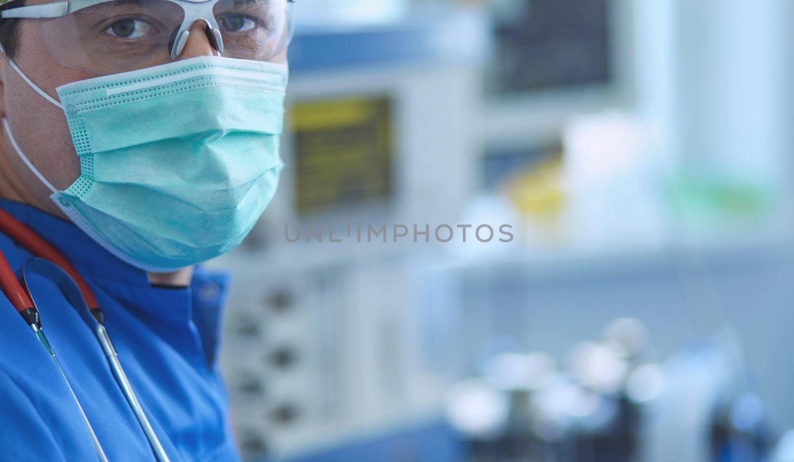 Male surgeon on background in operation room.
