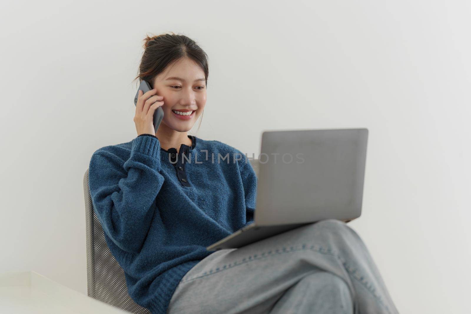 Image of Young woman working online on laptop computer. studying or working from home online concept