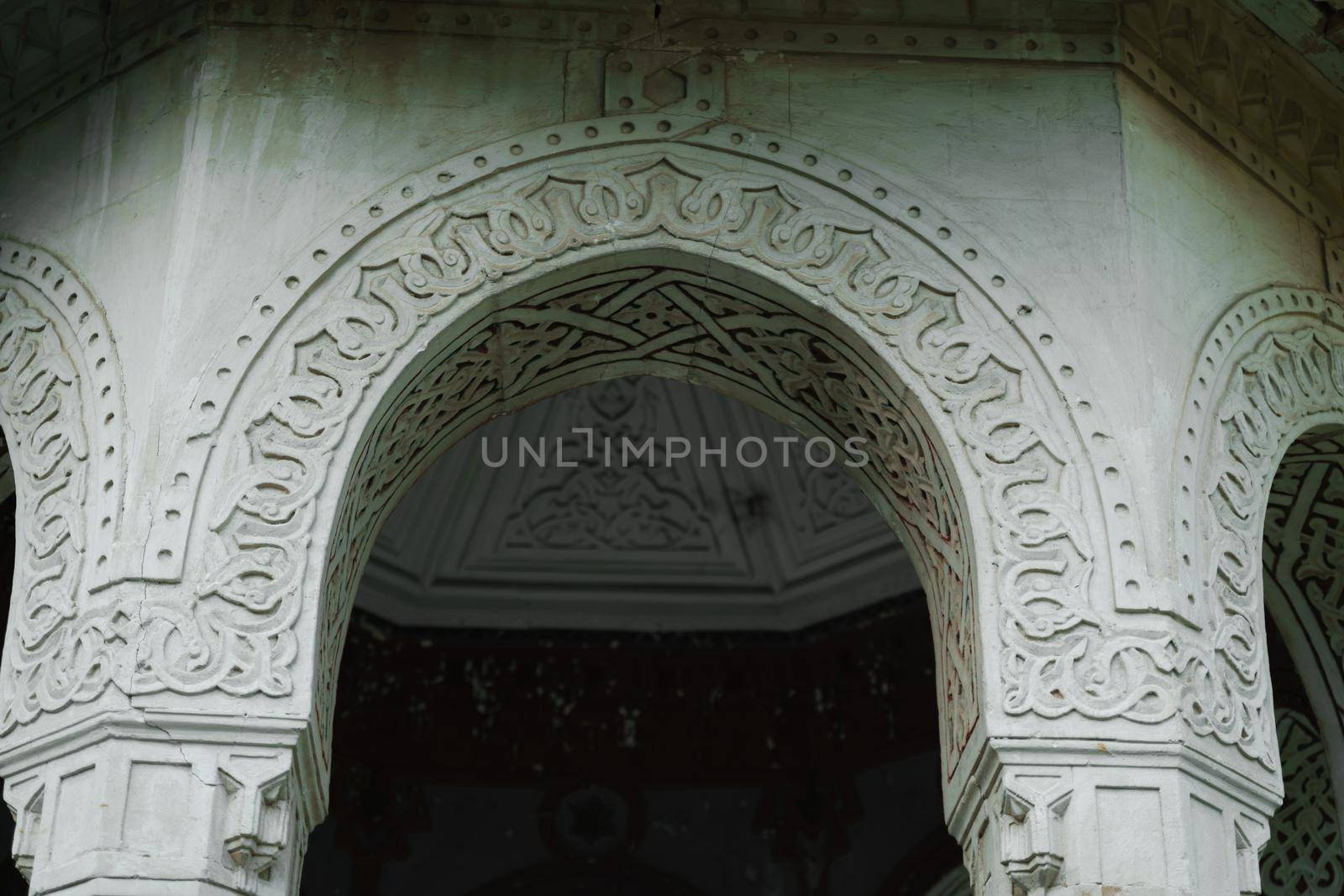 Stone arch on a white background. entrance door by Matiunina