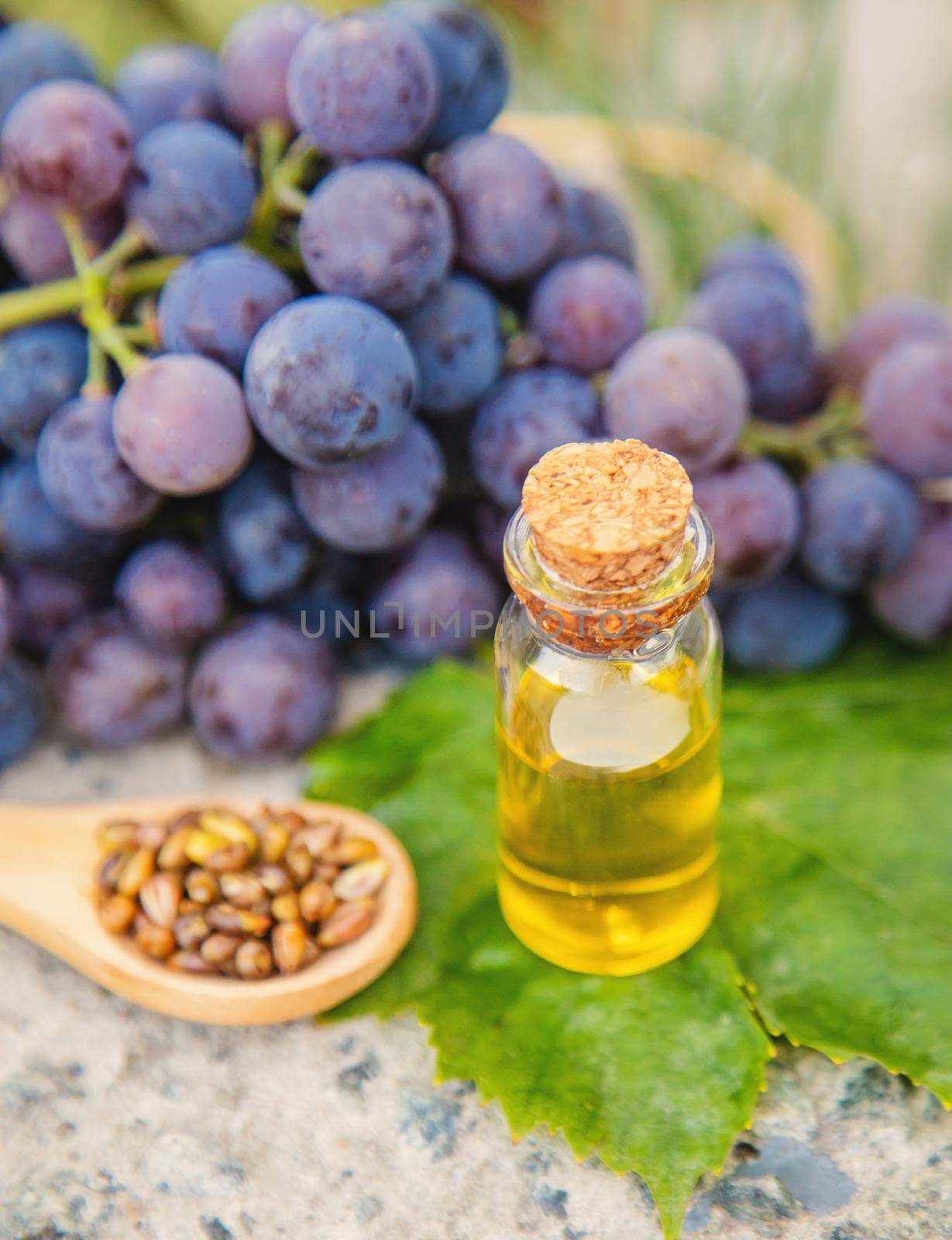 grape seed oil in a small jar. Selective focus.nature