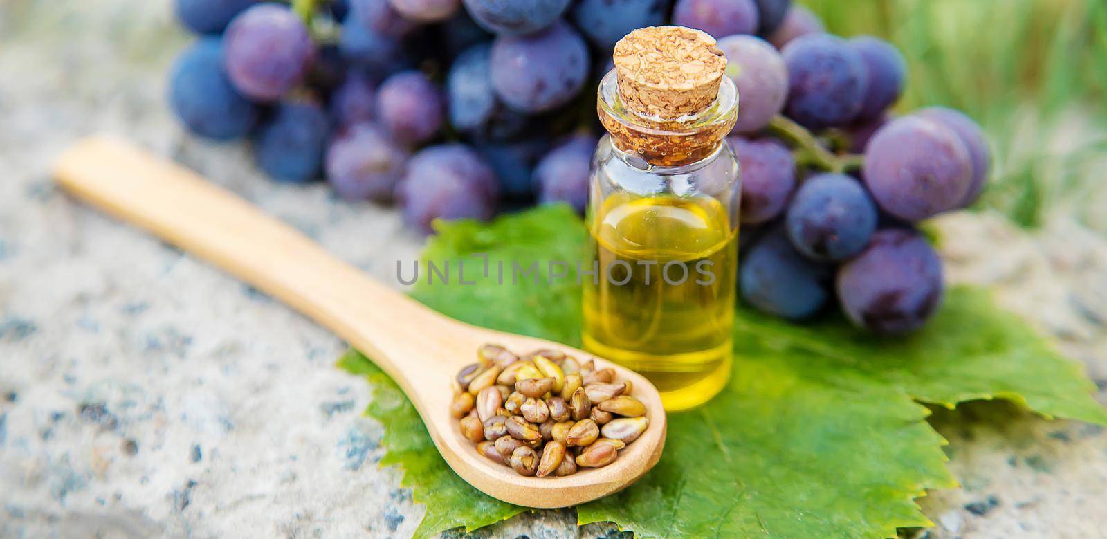 grape seed oil in a small jar. Selective focus.nature