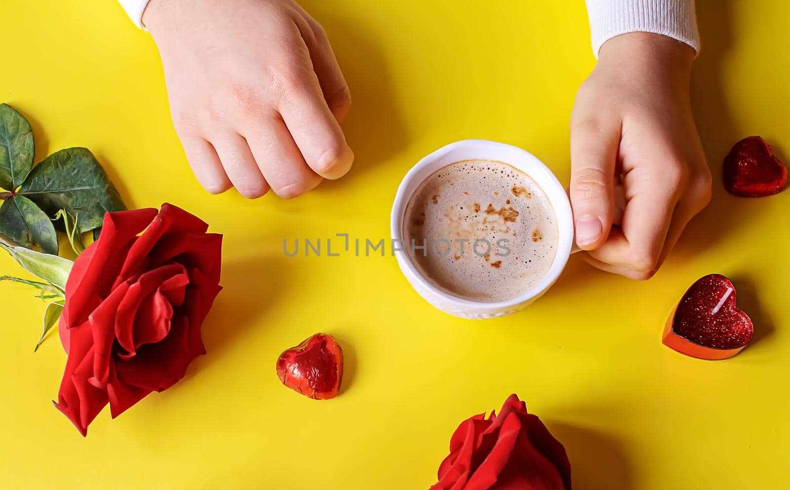 Cup drink for Breakfast in the hands of lovers. Selective focus. by mila1784