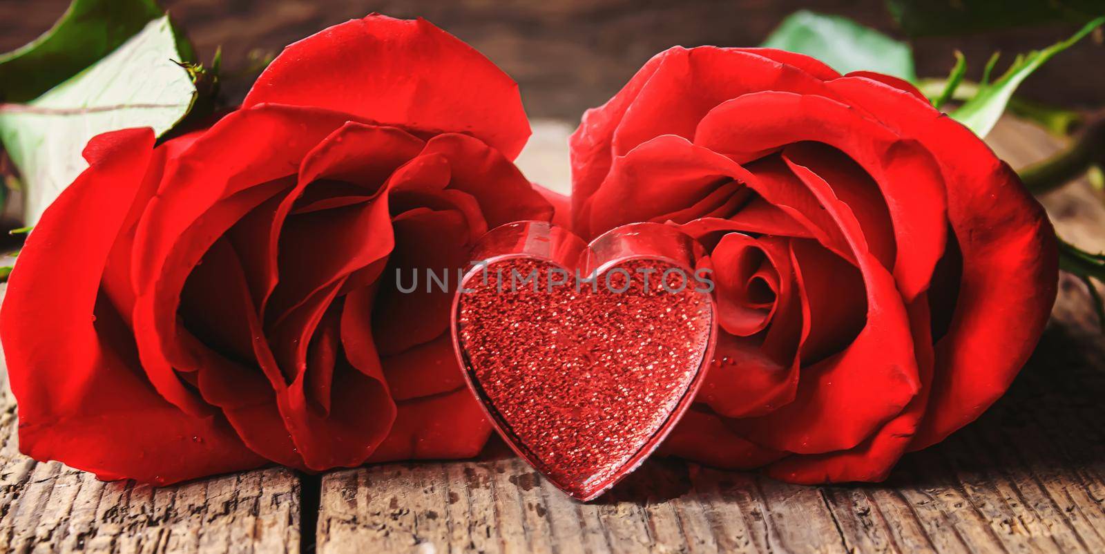 Gift box on a wooden background. Valentine's Day gift.selectiv focus.holiday