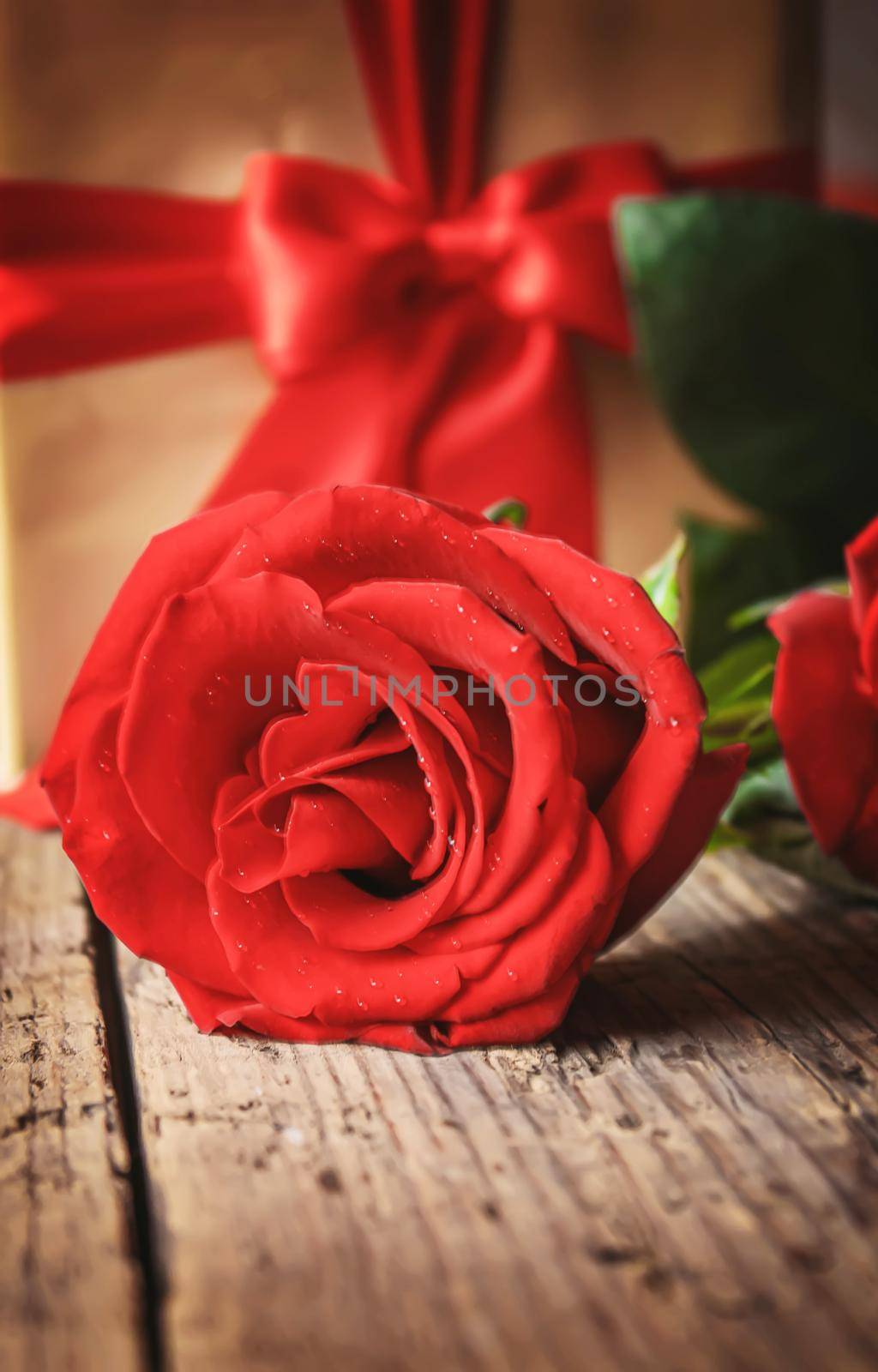 Gift box on a wooden background. Valentine's Day gift.selectiv focus.holiday