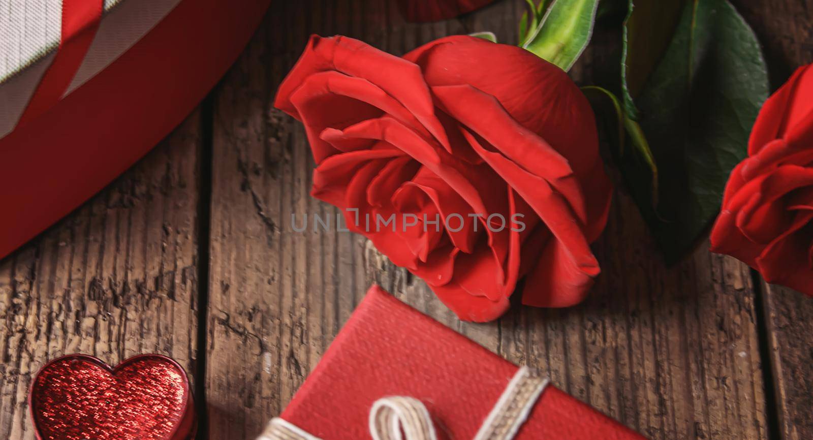 Gift box on a wooden background. Valentine's Day gift.selectiv focus.holiday