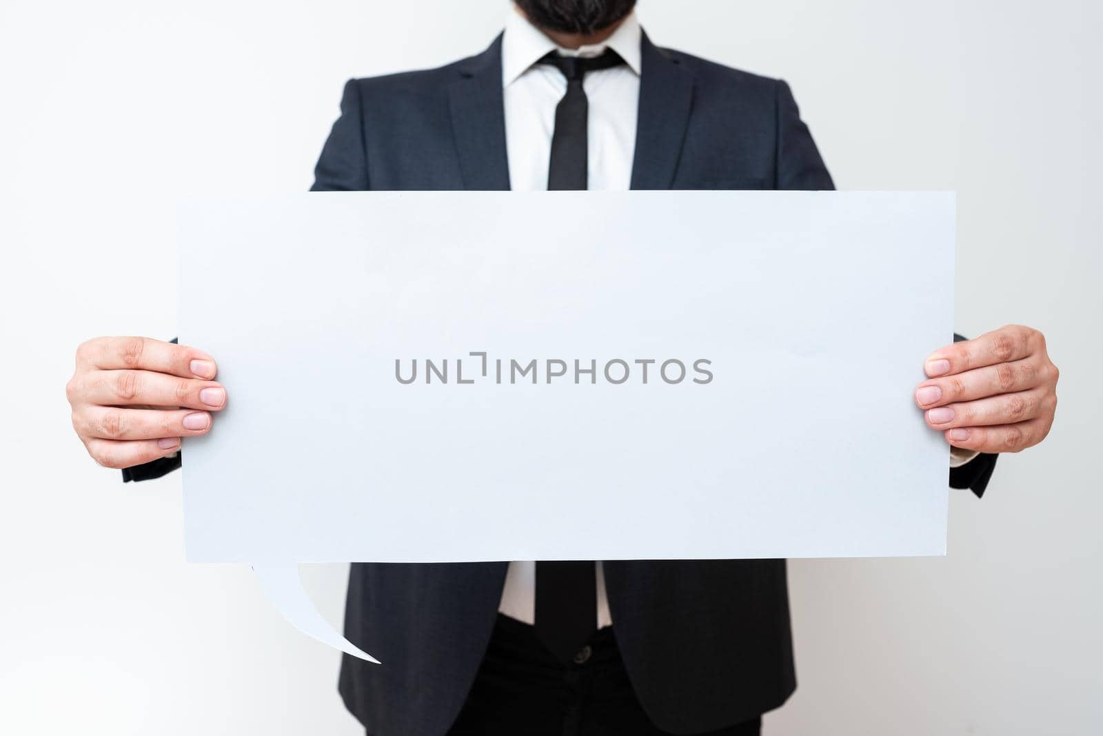 Businessman Holding Speech Bubble With Important Informations.