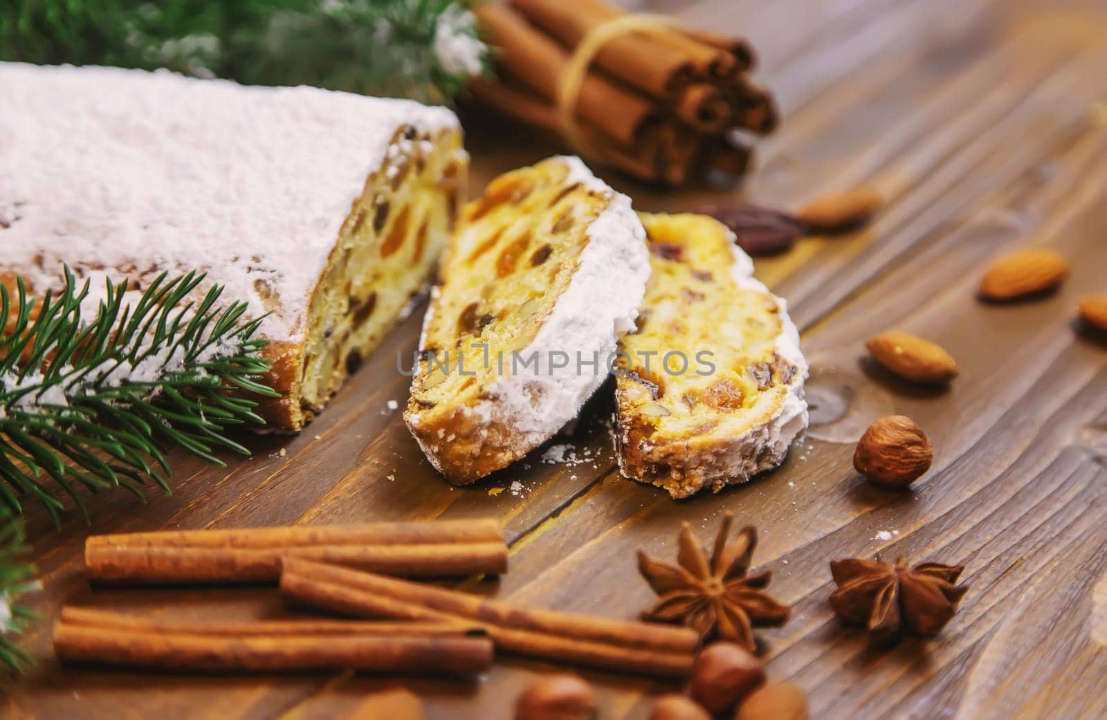 christmas stollen on wooden background. selective focus.holoday