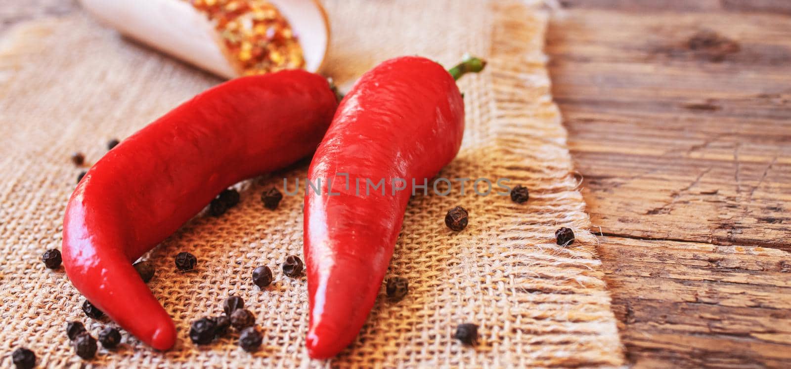 hot chili peppers on wooden background. selective focus.nature