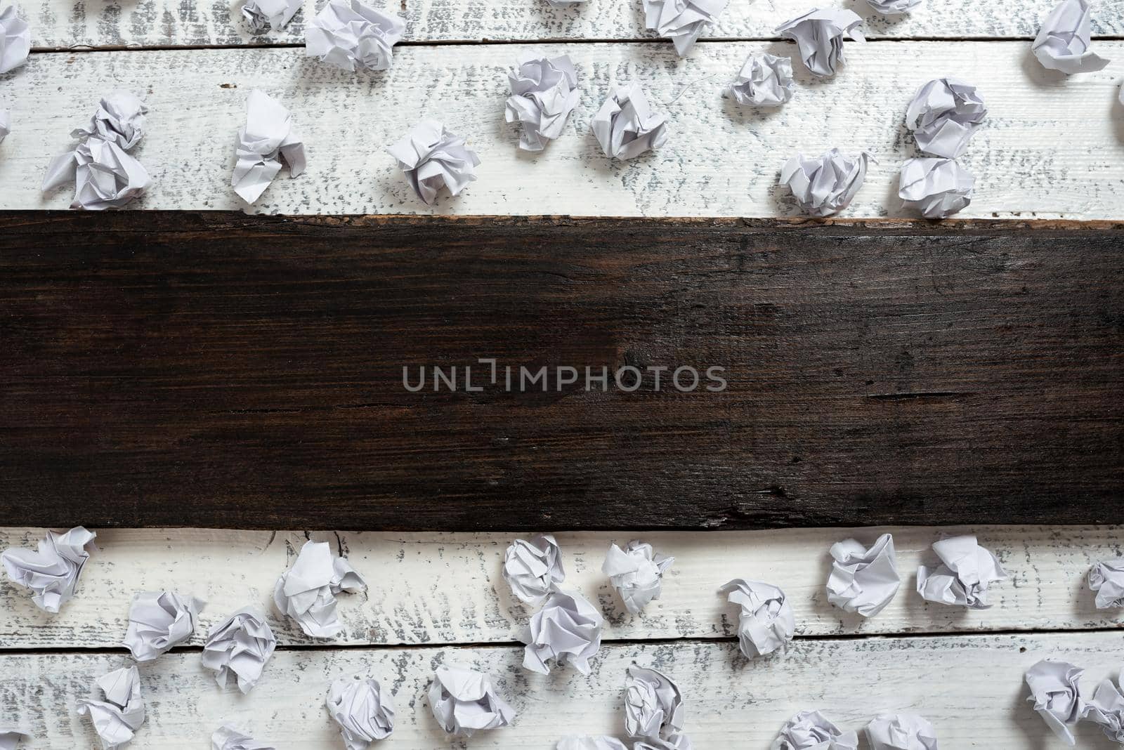 Important Ideas Written On Piece Of Wood With Paper Wraps Around On Floor.