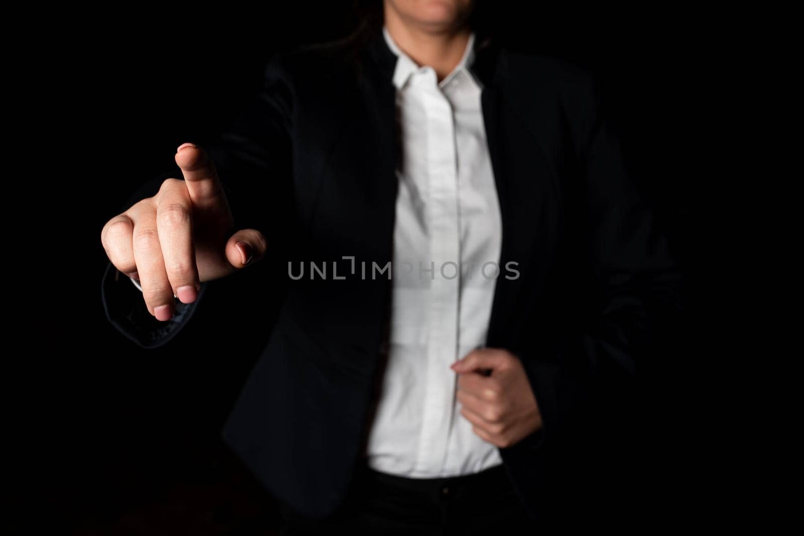 Businesswoman Pointing Important Infortmations With One Finger.