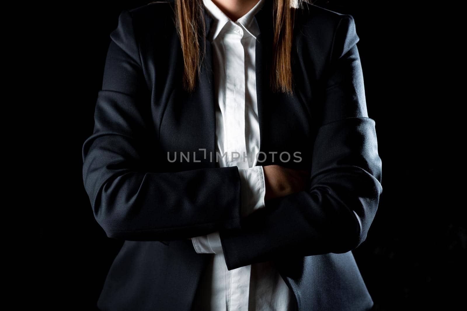 Standing Businesswoman With Crossed Arms Thinking New Ideas.