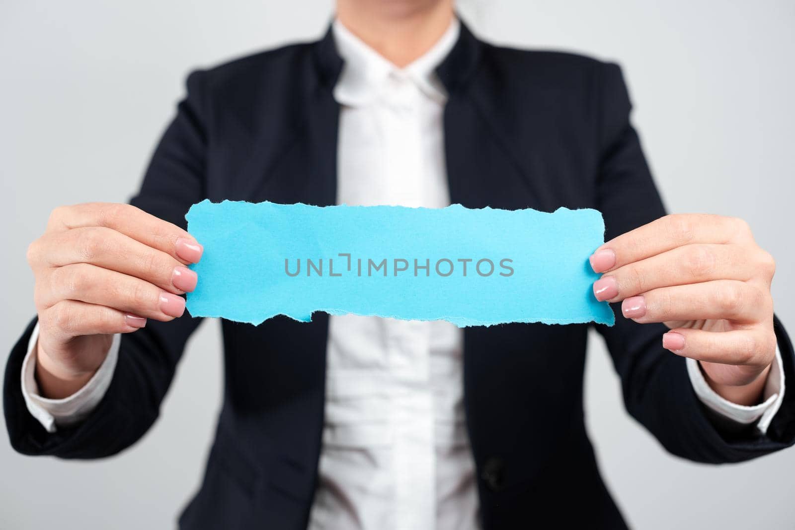 Businesswoman Holding Note With Important Message With Both Hands. Woman Presenting Crutial Information On Piece Of Paper. Executive Showing Critical Announcement. by nialowwa