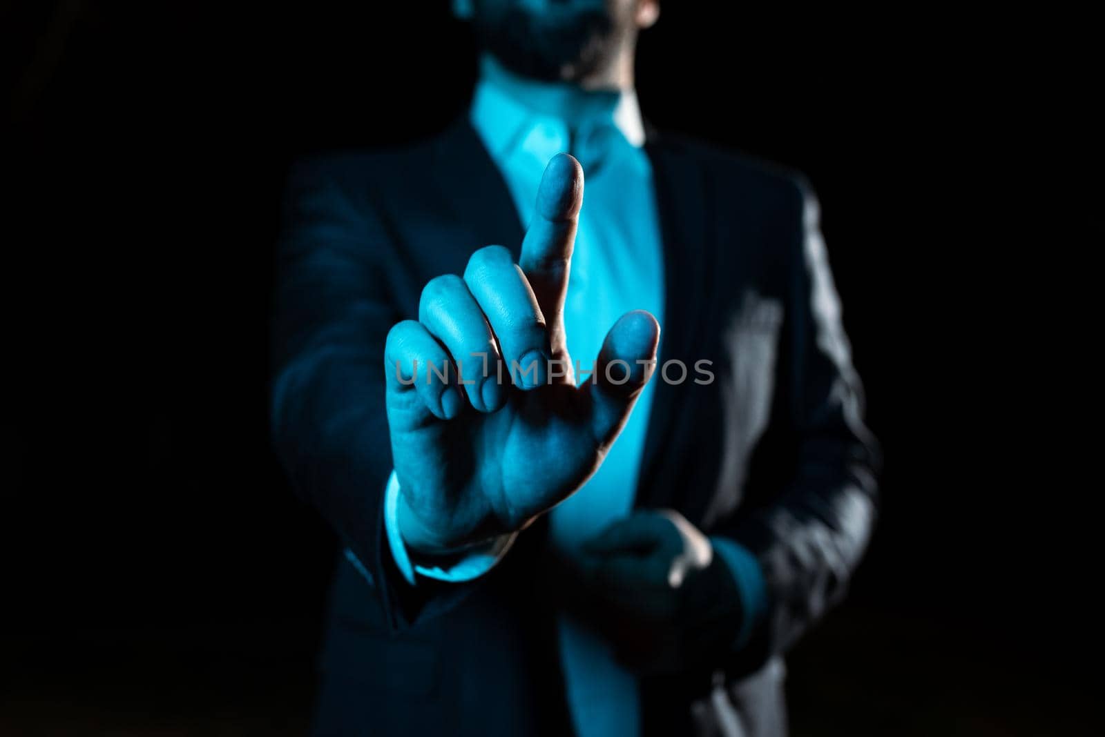 Businessman Pointing Important Infortmations With One Finger.