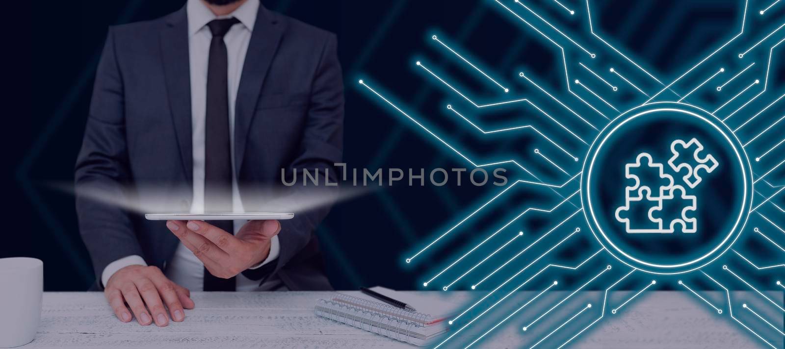 Businessman Holding A Tablet Presenting Important Software Data.