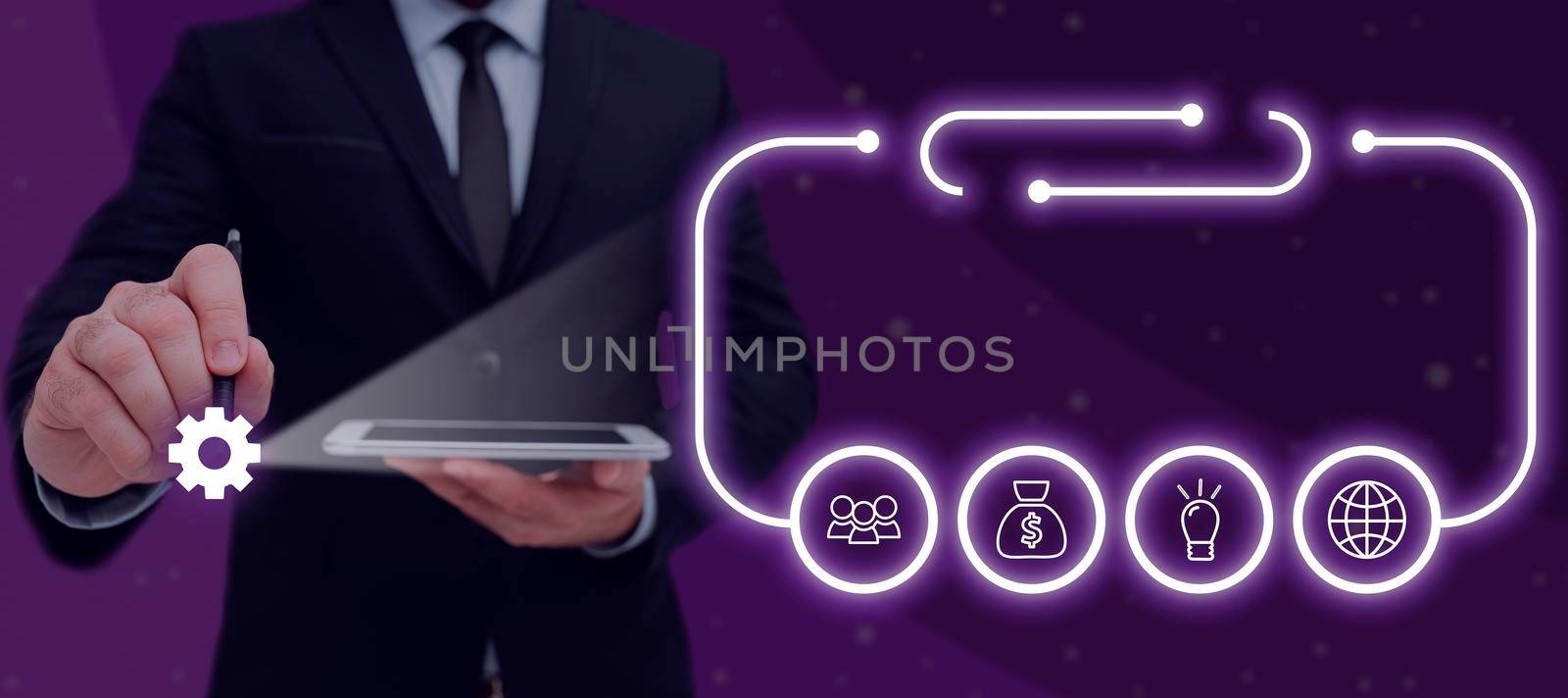 Businessman Holding Tablet And Pen Which Points On Sign And Presenting Crutial Ideas In Futuristic Frame. Man In Suit Having Cellphone And Pencil In Hand To Show New Data. by nialowwa